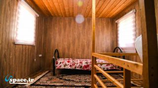 نمای داخلی اتاق اقامتگاه کلبه چوبی حاجی لیله - ماسال - روستای کیشخانی